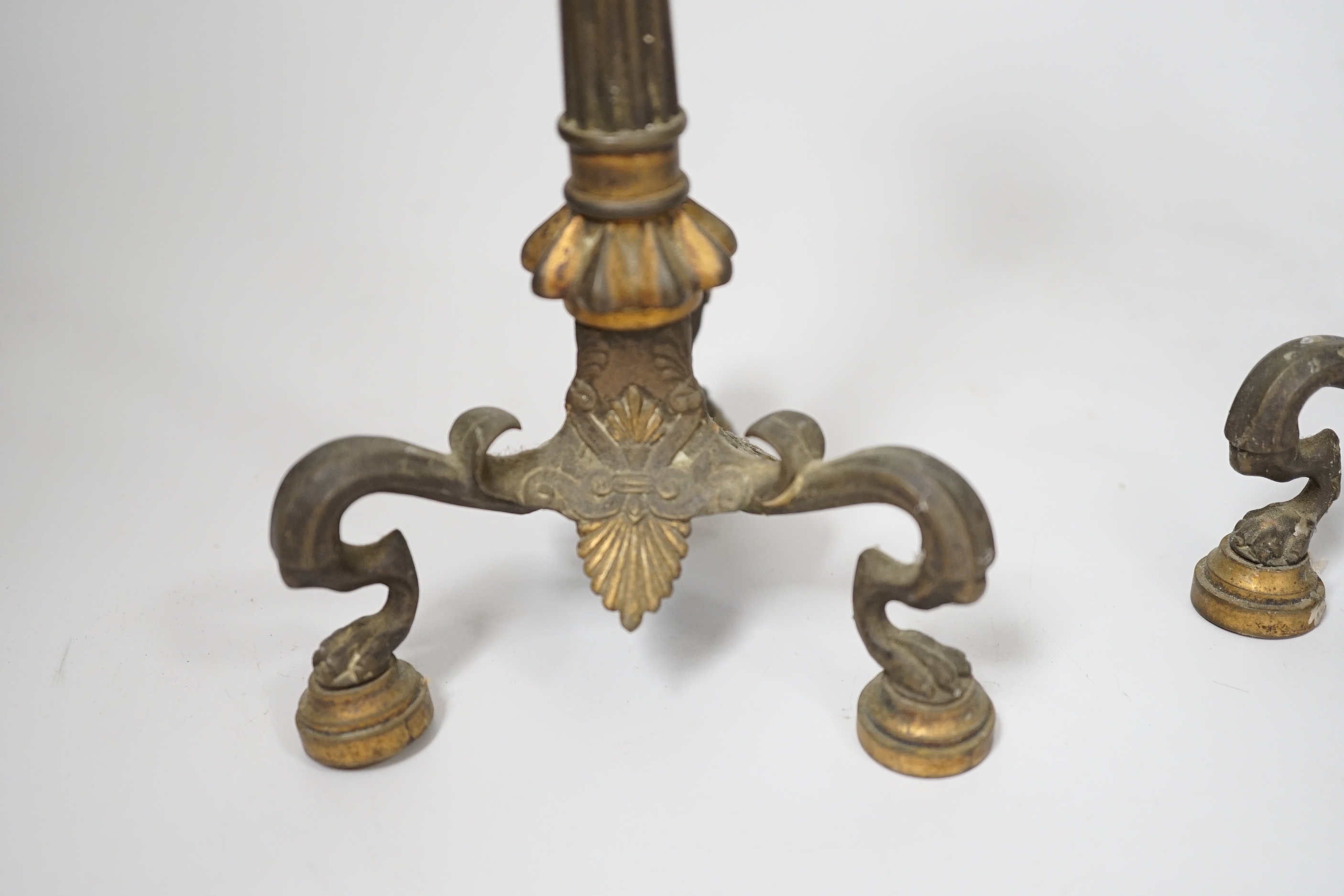 A pair of early 19th century brass candlesticks, 26cm